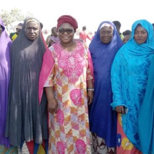 The Director and Founder of Ark of  Cypress Ms Maryanne Ngban with the women of Yeshi Community during an empowerment visit to the community
